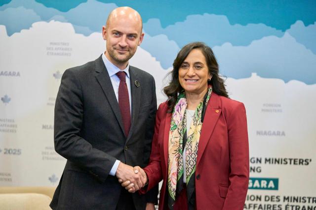 Canadian Foreign Minister Anita Anand and French Foreign Minister Jean-Noel Barrot shake hands during a bilateral meeting at the G7 foreign ministers meeting in Niagara-on-the-Lake, Ontario, on November 11, 2025. (Photo by Geoff Robins / AFP)