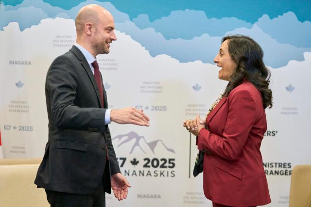 Canadian Foreign Minister Anita Anand speaks with French Foreign Minister Jean-Noel Barrot during a bilateral meeting during the G7 foreign ministers meeting in Niagara-on-the-Lake, Ontario, on November 11, 2025. (Photo by Geoff Robins / AFP)