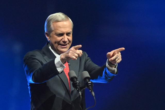 Chile's presidential candidate Jose Antonio Kast of the Republican Party delivers a speech during his closing campaign rally at Movistar Arena in Santiago on November 11, 2025. Chile will hold the presidential election on November 16, 2025. (Photo by MARVIN RECINOS / AFP)