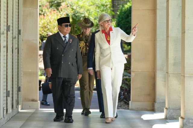Australia's Governor General Sam Mostyn (R) greets Indonesia's President Prabowo Subianto at Admiralty House in Sydney on November 12, 2025. (Photo by Rick Rycroft / POOL / AFP)