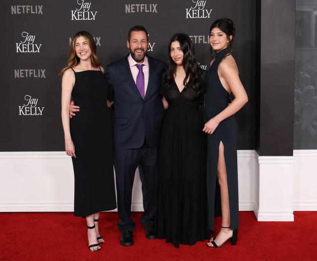 (L-R) Jackie Sandler, Adam Sandler, Sadie Sandler and Sunny Sandler attend the premiere of Netflix's "Jay Kelly" at the Egyptian Theater in Los Angeles on November 11, 2025. (Photo by Michael Tran / AFP)