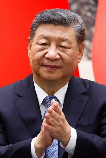 China's President Xi Jinping looks on during a signing ceremony with Spain's King Felipe VI at the Great Hall of the People in Beijing on November 12, 2025. (Photo by Maxim Shemetov / POOL / AFP)