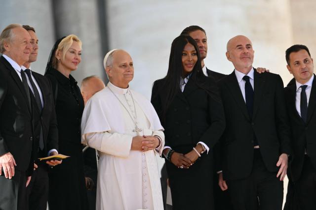 British supermodel and actress Naomi Campbell (C,R) attends Pope Leon XIV general audience at St. Peter square in the Vatican on November 12, 2025. (Photo by Alberto PIZZOLI / AFP)