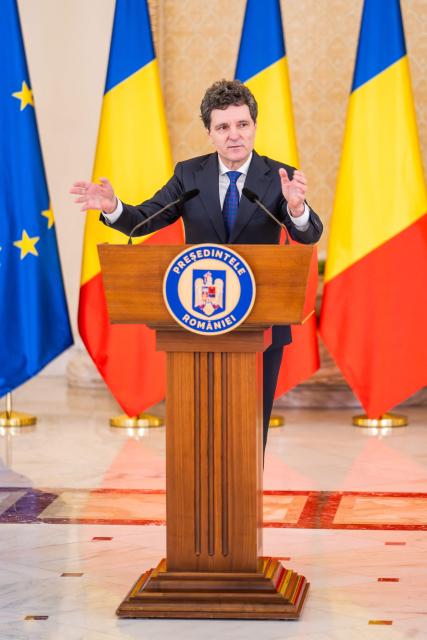 Romanian President Nicusor Dan addresses the media during a press conference at the presidential Cotroceni Palace in Bucharest, Romania, to present the country's new national defence strategy, on November 12, 2025. (Photo by Mihai BARBU / AFP)