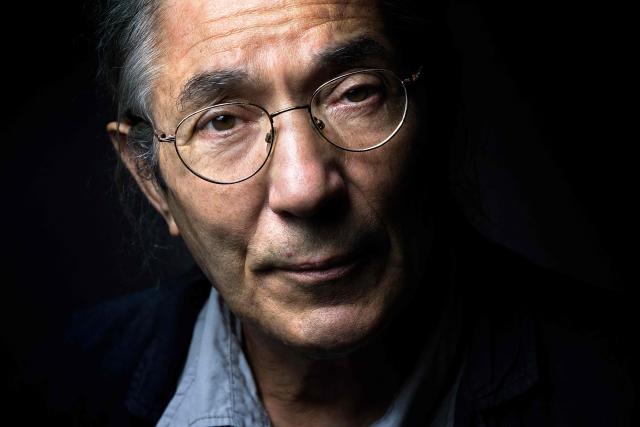 (FILES) Algerian writer Boualem Sansal poses in Paris on September 4, 2015. Algeria has accepted a German proposal to pardon French-Algerian writer Boualem Sansal, the presidency said on November 12, 2025, adding that he was being transferred to Germany for medical treatment after a year in detention. (Photo by Joël SAGET / AFP)
