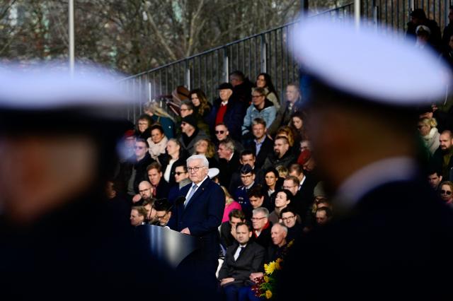 German President Frank-Walter Steinmeier delivers a speech during a military ceremony to celebrate the 70th anniversary of the German armed forces Bundeswehr, on November 12, 2025 in front of the Chancellery in Berlin. (Photo by Tobias SCHWARZ / AFP)