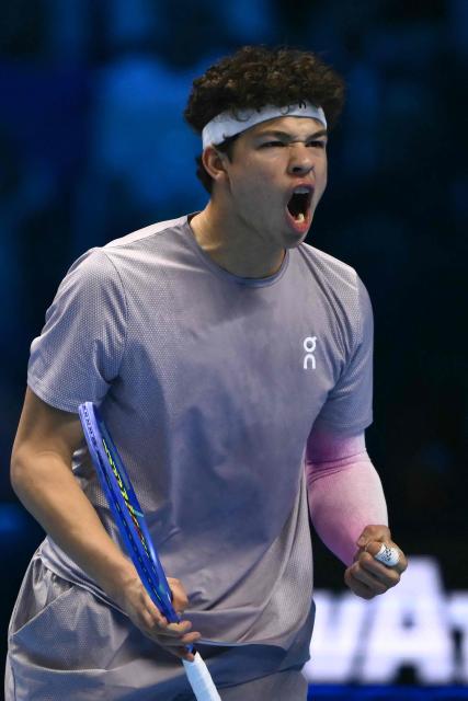 USA's Ben Shelton reacts during his match against Canada's Felix Auger-Aliassime at the ATP Finals tennis tournament in Turin on November 12, 2025. (Photo by Marco BERTORELLO / AFP)