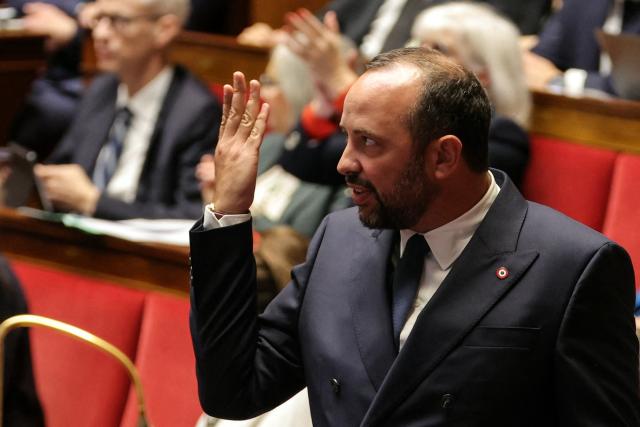 UDR's MP Gerault Verny gestures during a session to debate on France's 2026 social security budget bill (PLFSS) prior to vote at the Assemblee Nationale, France's Parliament lower house, in Paris on November 12, 2025. The President of the National Assembly called MP Gerault Verny to order after he allegedly made a remark deemed sexist during Ecologiste et Social's MP Sandrine Rousseau's speech. (Photo by Thomas SAMSON / AFP)