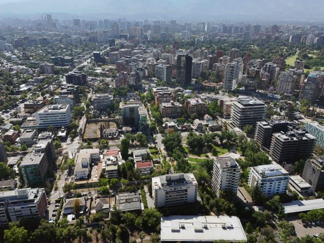 Aerial view of Santiago, on November 12, 2025. Chile will hold presidential and parliamentary elections on November 16. (Photo by Marvin RECINOS / AFP)