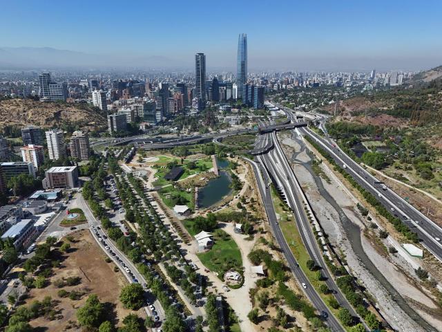Aerial view of the Mapocho River in Santiago, on November 12, 2025. Chile will hold presidential and parliamentary elections on November 16. (Photo by Marvin RECINOS / AFP)