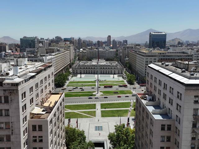 Aerial view of the La Moneda presidential palace in Santiago, on November 12, 2025. Chile will hold presidential and parliamentary elections on November 16. (Photo by Marvin RECINOS / AFP)