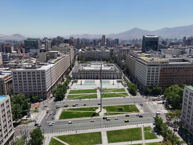 Aerial view of the La Moneda presidential palace in Santiago, on November 12, 2025. Chile will hold presidential and parliamentary elections on November 16. (Photo by Marvin RECINOS / AFP)