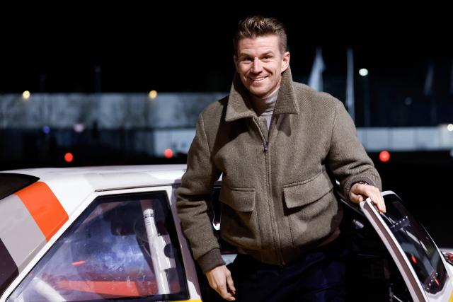 Kick Sauber's German driver Nico Hulkenberg arrives for the presentation of the Audi F1 factory team's car set to compete in the Formula One starting in the 2026 season in Munich, southern Germany on November 12, 2025. (Photo by Alexandra BEIER / AFP)