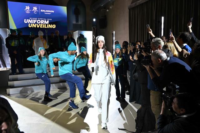 A picture shows the torchbearer uniform during a press presentation of the official Milano Cortina 2026 volunteer uniforms, in Milan on November 12, 2025. (Photo by PIERO CRUCIATTI / AFP)