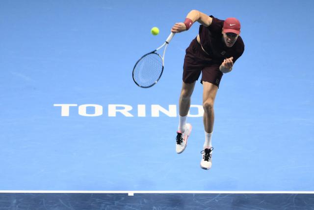 Italy's Jannik Sinner serves against Germany's Alexander Zverev at the ATP Finals tennis tournament in Turin on November 12, 2025. (Photo by Marco BERTORELLO / AFP)