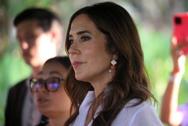 Denmark's Queen Mary gestures during her visit to Utinga Park in the sidelines of the COP30 UN Climate Change Conference in Belem, Para State, Brazil on November 12, 2025. (Photo by Mauro PIMENTEL / AFP)