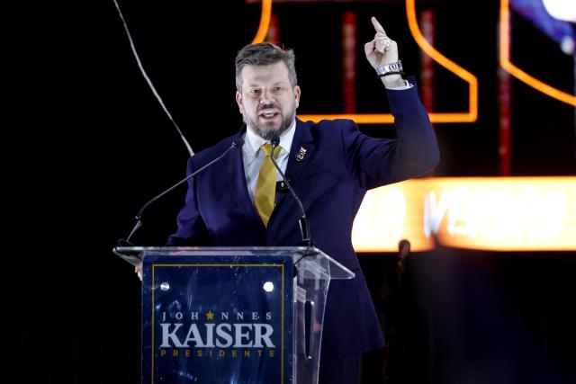 Chile's presidential candidate Johannes Kaiser of the Libertarian National Party speaks to supporters during his closing campaign rally at Movistar Arena in Santiago on November 12, 2025. (Photo by Raul BRAVO / AFP)