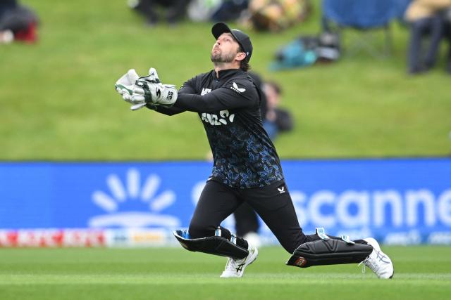 New Zealand's Devon Conway catches the ball to dismiss West Indies' Shai Hope during the fifth and final Twenty20 international cricket match between New Zealand and West Indies at University of Otago Oval in Dunedin on November 13, 2025. (Photo by Sanka VIDANAGAMA / AFP)