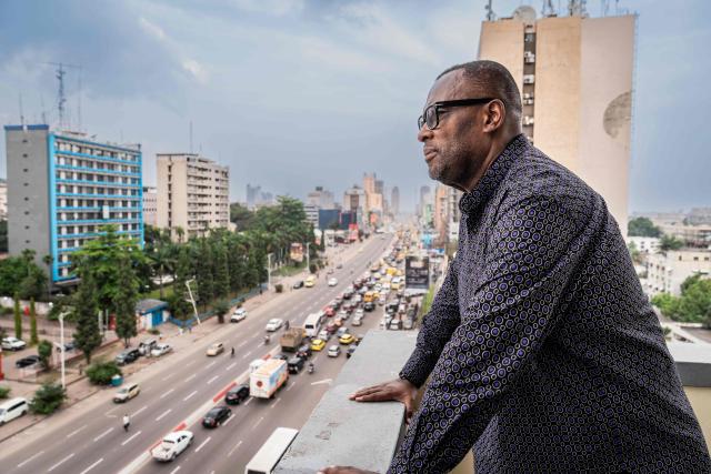 Nzanga Mobutu, son of former President Mobutu Sese Seko, poses for a portrait in Kinshasa, on October 20, 2025. Almost thirty years after the fall of Mobutu Sese Seko, an exhibition dedicated to the former president of Zaire (now the Democratic Republic of Congo, DRC) is generating keen interest among young Congolese born after 1997. Entitled ‘Mobutu, a life, a destiny’, the exhibition, organised by the family of the former president of the Republic, presents personal items, photographs and other archival documents. (Photo by Glody MURHABAZI / AFP)