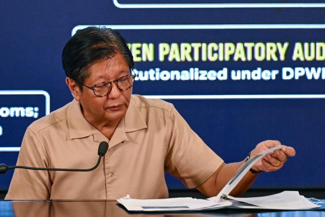 Philippines' President Ferdinand Marcos Jr speaks during a press conference at Malacanang Palace in Manila on November 13, 2025. President Ferdinand Marcos on November 13 vowed that those implicated in the Philippine’s spiraling flood control scandal would be arrested before Christmas, days after deadly back-to-back typhoons left swathes of the country underwater. Rage over so-called ghost infrastructure projects has been mounting since Marcos put the issue centre stage in his state of the nation address in July. (Photo by Jam STA ROSA / AFP)