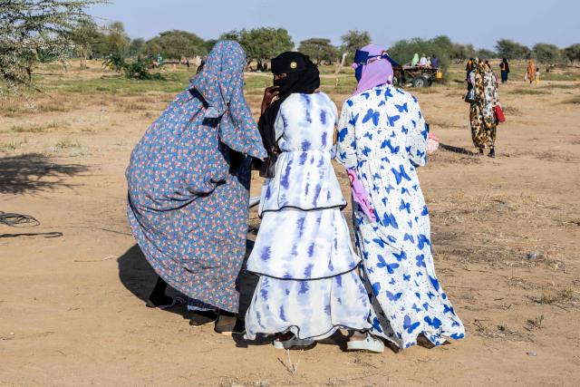 TOPSHOT - Sudanese refugees converse at the Oure Cassoni camp in Chad on November 12, 2025. With the last army stronghold in Sudan's western Darfur region having fallen to paramilitary forces on October 26, the United Nations expects a mass influx of refugees, but it is unclear how many will actually make it to neighbouring Chad.
The Rapid Support Forces (RSF), fighting a brutal war with Sudan's army for more than two years, claimed full control of El-Fasher, having besieged the capital of North Darfur state for nearly 18 months, causing countless thousands of people to flee. (Photo by Joris Bolomey / AFP)