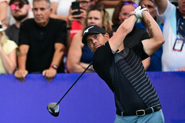 France's Adrien Saddier tees off at the first hole on day one of the DP World Tour Championship 2025 golf tournament at Jumeirah Golf Estates in Dubai on November 13, 2025. (Photo by Giuseppe CACACE / AFP)