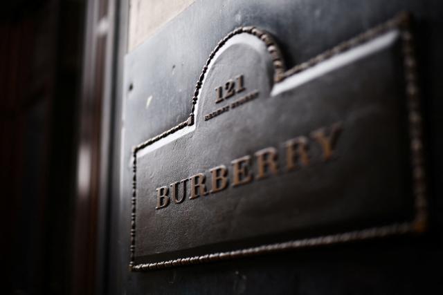 (FILES) This photograph taken on September 2, 2024 shows the entrance plaque of the British fashion label Burberry outside the store in central London. Burberry said on November 13, 2025 it narrowed losses in its first half thanks to the British luxury fashion label's turnaround plan begun a year ago. Its net loss stood at 26 million pounds (34 million USD) in the six months to the end of September, down on a loss after tax of 74 million pounds one year earlier. (Photo by HENRY NICHOLLS / AFP)