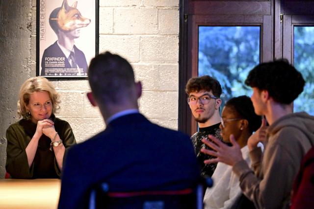 Queen Mathilde of Belgium looks on during a royal visit to the 'Foxfinder' play for deaf and hard of hearing students of the "Institut Royal pour Sourds et Aveugles" (IRSA) school in Brussels on November 13, 2025. (Photo by DIRK WAEM / Belga / AFP) / Belgium OUT