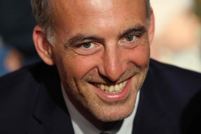 Co-president of French center-left party Place publique (PP) Raphael Glucksmann attends a ceremony marking a decade since the terror attacks of November 13, 2015 in which 130 civilians were killed, at the "Jardin de 13 novembre 2015" in Paris on November 13, 2025. (Photo by Ludovic MARIN / POOL / AFP)