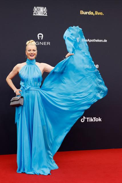 German model Franziska Knuppe arrives on the red carpet to attend the ceremony for the German media award Bambi in Munich, southern Germany on November 13, 2025. (Photo by Michaela STACHE / AFP)
