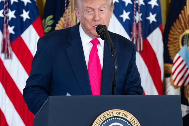 US President Donald Trump speaks prior to signing an executive order on foster children and families in the East Room of the White House in Washington, DC, November 13, 2025. The executive order will be focused on supporting foster youth transitioning out of the system to adulthood by expanding and enhancing access to education, workforce and career development, digital resources, and other supports. (Photo by SAUL LOEB / AFP)