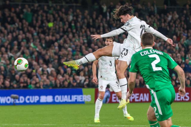 Portugal's midfielder Vitor Ferreira shoots but misses during the men's football 2026 World Cup Group F qualifier between Ireland and Portugal at Aviva Stadium in Dublin on November 13, 2025. (Photo by Paul Faith / AFP)