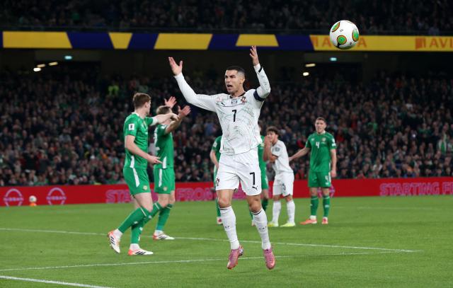 Portugal's forward Cristiano Ronaldo reacts during the men's football 2026 World Cup Group F qualifier between Ireland and Portugal at Aviva Stadium in Dublin on November 13, 2025. (Photo by Paul Faith / AFP)
