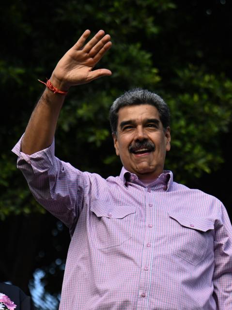 Venezuela's President Nicolas Maduro during a demonstration on Youth Day in Caracas on November 13, 2025. (Photo by Juan BARRETO / AFP)