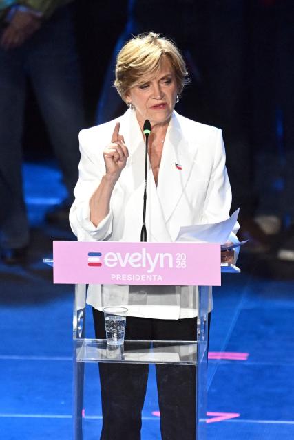Chile's presidential candidate Evelyn Matthei of the Independent Democratic Union speaks to supporters during her closing campaign rally at the Santa Laura USEK stadium in Santiago on November 13, 2025. (Photo by MARVIN RECINOS / AFP)