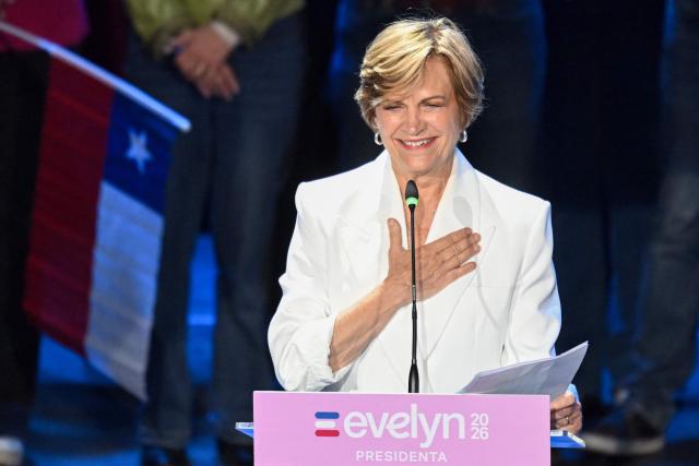Chile's presidential candidate Evelyn Matthei of the Independent Democratic Union gestures as she speaks to supporters during her closing campaign rally at the Santa Laura USEK stadium in Santiago on November 13, 2025. (Photo by MARVIN RECINOS / AFP)