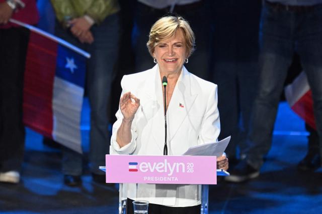 Chile's presidential candidate Evelyn Matthei of the Independent Democratic Union speaks to supporters during her closing campaign rally at the Santa Laura USEK stadium in Santiago on November 13, 2025. (Photo by MARVIN RECINOS / AFP)