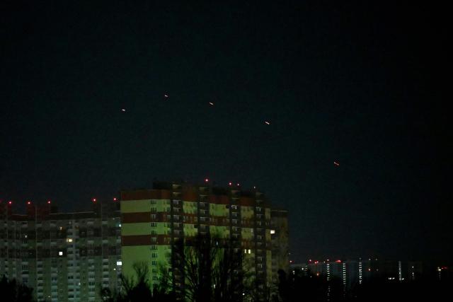 This photo shows Ukrainian air defence firing at Russian drones above Kyiv on November 14, 2025, amid the Russian invasion of Ukraine. Kyiv was under a 'massive' attack early November 14 morning, the Ukrainian capital's mayor said, with AFP journalists reporting explosions in the city. "Air defence forces are operating in Kyiv. A massive enemy attack on the capital," Vitaly Klitschko posted on Telegram, reporting two people wounded in the eastern Dniprovsky district. (Photo by Sergei SUPINSKY / AFP)