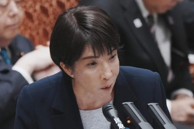 Japan's Prime Minister Sanae Takaichi answers a question during a session of the House of Councillors Budget Committee at the National Diet in Tokyo on November 14, 2025. (Photo by Kazuhiro NOGI / AFP)