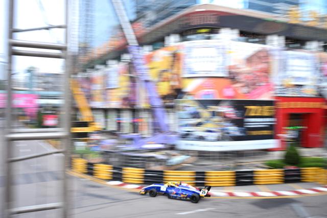 French Formula 4 driver Rayan Caretti drives during the second practice session of the 72nd Macau Grand Prix in Macau on November 14, 2025. (Photo by Peter PARKS / AFP)