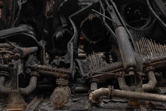 This photographed shows scorched equipment at a power plant of Ukrainian energy provider DTEK, which was damaged by constant Russian air attacks, at an undisclosed location on November 13, 2025, amid the Russian invasion of Ukraine. Russia has escalated aerial attacks on Ukrainian energy facilities and rail systems over recent weeks, mirroring similar campaigns launched over the previous three winters that left people without heating in frigid temperatures. (Photo by Roman PILIPEY / AFP)