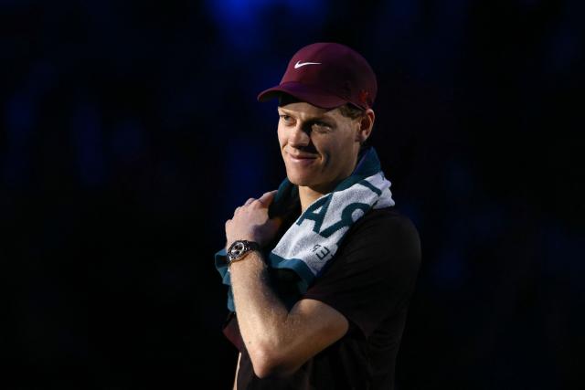 Italy's Jannik Sinner looks on after winning his match against USA's Ben Shelton at the ATP Finals tennis tournament in Turin on November 14, 2025. (Photo by Marco BERTORELLO / AFP)