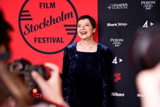 Italian-American actress Isabella Rossellini, guest of honour, poses on the red carpet for the screening of the film 'Blue Velvet' (1986) during the Stockholm Film Festival at the Bio Skandia cinema in Stockholm on November 14, 2025. (Photo by Caisa RASMUSSEN / TT News Agency / AFP) / Sweden OUT