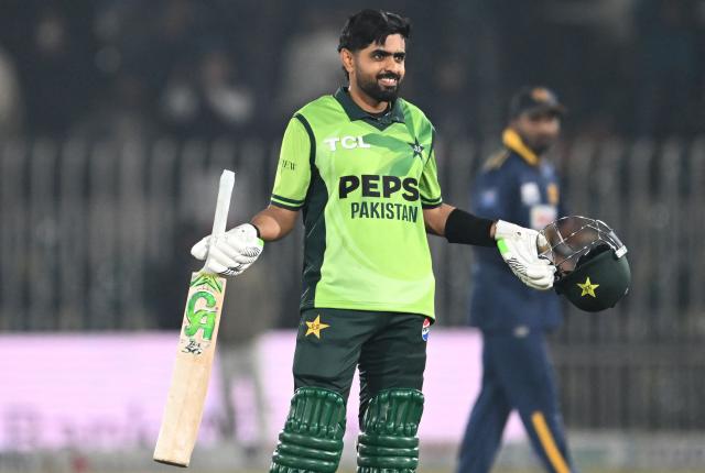 Pakistan's Babar Azam celebrates after scoring a century during the second one-day international (ODI) cricket match between Pakistan and Sri Lanka at the Rawalpindi Cricket Stadium in Rawalpindi on November 14, 2025. (Photo by Farooq NAEEM / AFP)