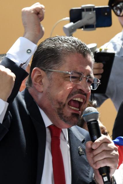 Costa Rica's President Rodrigo Chaves speaks to supporters after appearing before the Special Commission for the Lifting of Immunity of Members of the Legislative Assembly, in San Jose on November 14, 2025. Chaves is accused of political belligerence during his administration. (Photo by EZEQUIEL BECERRA / AFP)