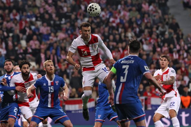 Croatia's forward #14 Ivan Perisic (C) heads the ball during the 2026 World Cup qualifiers Europe zone group L football match between Croatia and Faroe Islands at the Stadion HNK in Rijeka, on November 14, 2025. (Photo by AFP)