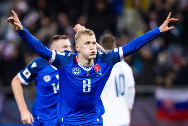 Slovakia's forward #08 Tomas Bobcek celebrates scoring his team's first goal just before the end of the World Cup 2026 European Qualifiers football match between Slovakia and Northern Ireland on November 14, 2025 in Kosice, Slovakia. Slovakia won the match 1-0. (Photo by Branislav Racko / AFP)