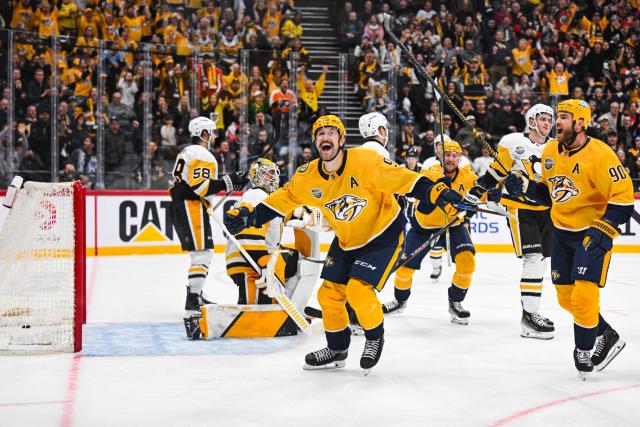 Nashville Predators' forward Filip Forsberg #09 (L) and team mates celebrate after scoring the 1-1 goal during the NHL Global Series Ice Hockey match between Pittsburgh Penguins and Nashville Predators in Stockholm on November 14, 2025. Nashville Predators won the match 2-1. (Photo by Jonathan NACKSTRAND / AFP)