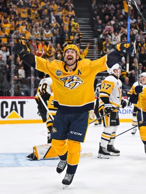 Nashville Predators' forward Filip Forsberg #09 and team mates celebrate after scoring the 1-1 goal during the NHL Global Series Ice Hockey match between Pittsburgh Penguins and Nashville Predators in Stockholm on November 14, 2025. Nashville Predators won the match 2-1. (Photo by Jonathan NACKSTRAND / AFP)