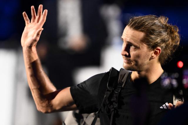 Germany's Alexander Zverev reacts after his men's single match against Canada's Felix Auger Aliassime at the ATP Finals tennis tournament, in Turin, on November 14, 2025. (Photo by MARCO BERTORELLO / AFP)
